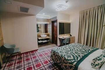 Фото номера Двухместный номер с 1 кроватью Отель Lostrita - Pastravrie, Hotel &amp; SPA г. Valea Neagră 15