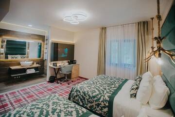 Фото номера Трехместный номер Отель Lostrita - Pastravrie, Hotel &amp; SPA г. Valea Neagră 3