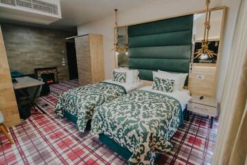 Фото номера Двухместный номер с 1 кроватью Отель Lostrita - Pastravrie, Hotel &amp; SPA г. Valea Neagră 9